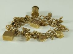A 9 carat gold bracelet, of narrow curb links, to a padlock clasp with safety chain,