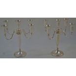 A pair of silver plated five light candelabrum, 31.