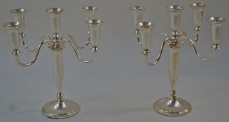 A pair of silver plated five light candelabrum, 31.