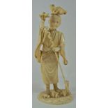 A late 19th century Japanese ivory figure of a wiseman with a toad on his head,