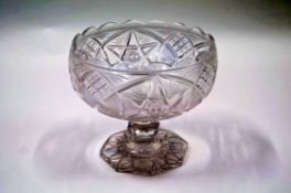 A Victorian cut glass rose bowl with strawberry cut panels,