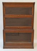 A Grand Rapids oak lawyers bookcase in three sections, with GRM trademark to the back,