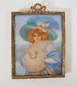 A decorative miniature of a young lady wearing a hat and a muff, signed lower left, 7.