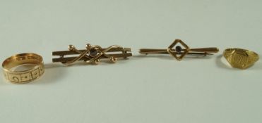 A stone set bar brooch; another similar; a 9 carat gold signet ring;