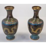 A pair of Chinese cloisonne vases decorated with dragons chasing a flaming pearl,