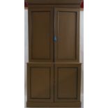 A painted mahogany two tier standing cupboard with two cupboard doors above a further two doors on