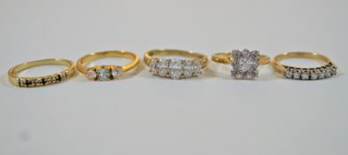 A ring set with cubic zirconia, stamped '14ct', 2.