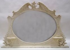 A Victorian over mantel mirror with Rococo frame and two brackets,