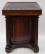 A Victorian rosewood Davenport with canvas inset top,