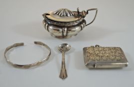 A silver vesta case; with a mustard pot with spoon and glass liner;