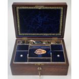 A Victorian rosewood sewing box with inset mother of pearl shield to the top,