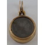A Victorian compass locket fob, the glazed compass with a hinged back, inscribed 'Norman',