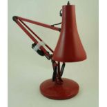 A model 90 Anglepoise lamp in red