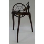 A George III mahogany and brass spinning wheel with brass name plate "S.