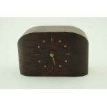 A mid 20th century yew mantel clock with copper batons, with makers monogram to the case verso ELK,