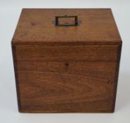 A mahogany box with brass inset handle, 25cm high, 30.