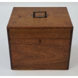 A mahogany box with brass inset handle, 25cm high, 30.