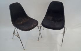 A pair of Herman Miller chairs, with chrome bases,