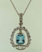 An aquamarine and diamond pendant and chain,