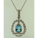 An aquamarine and diamond pendant and chain,