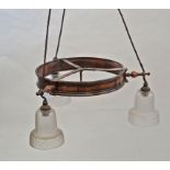 An early 20th century adjustable hanging ceiling light the cooper band suspending three frosted