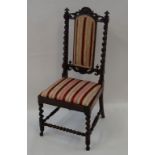 A Victorian rosewood chair with barley twist upright,