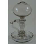 A late 18th century glass lace makers lamp with bulbous top and knopped stem,