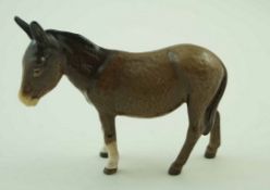 A Beswick figure of a donkey, printed factory marks in black,