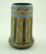 A Royal Doulton pottery vase of cylindrical form with incised decoration with blue and green glazes,