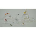 A collection of Swarovski crystal figures comprising of a Christmas tree,