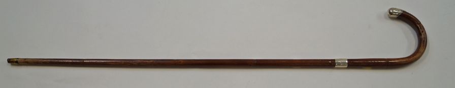 A malacca walking stick, with a silver collar, Birmingham 1919,