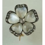 A moonstone and diamond flower brooch,