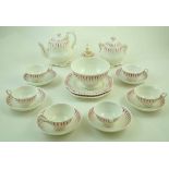 A Victorian children's tea service each decorated in puce, comprising of a teapot and cover,