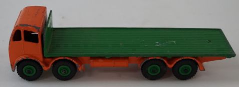 A Dinky toy Foden eight wheeler green load flat bed