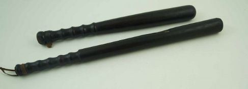 Two 20th century turned truncheons,