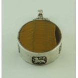 A tiger's eye and silver pendant, maker MK, Sheffield 1979,