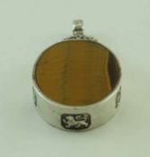 A tiger's eye and silver pendant, maker MK, Sheffield 1979,