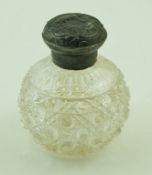 A silver mounted spherical clear cut glass scent bottle,