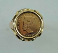 An Egyptian gold coin, in a ring mount, finger size L, 3.