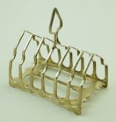A silver six division toast rack, Sheffield 1907 by James Dixon and Sons Ltd,