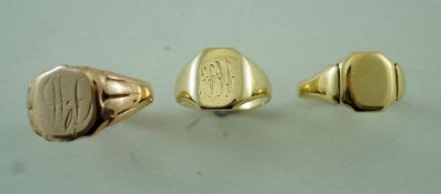 An 18ct gold signet ring, 4.5 g gross; and two other rings, 8.