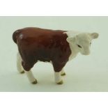 A Beswick figure of a Hereford calf, printed factory marks in black, 9.