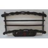 A 19th century North European hanging plate rack,