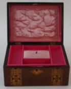A Victorian walnut and parquetry jewellery box, 26.