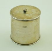 A late Victorian silver cylindrical box and cover,
