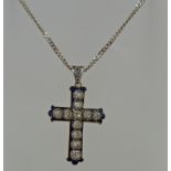 An enamel and diamond cross,