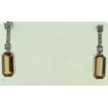 A pair of topaz and diamond drop earrings,