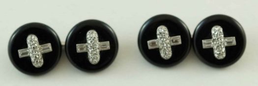 A pair of French onyx and diamond cufflinks,
