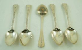 A set of four silver tea spoons,