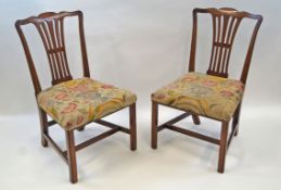 A pair of George III mahogany chairs with pierced splats,